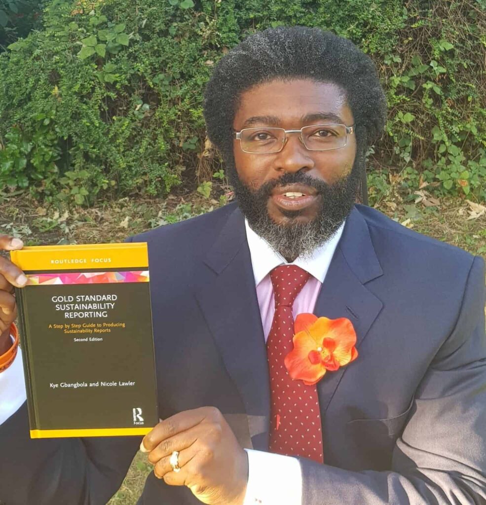 Photo of Kye Gbangbola with his book